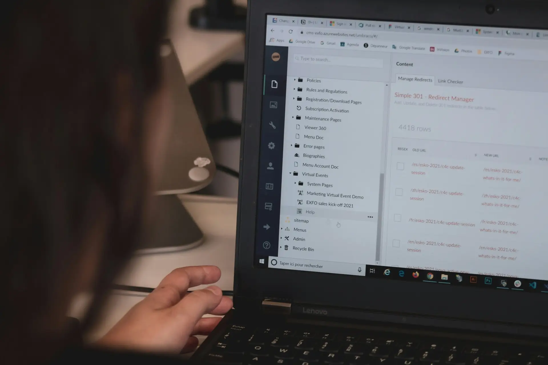 Founder writing at a desk in a small studio — brand voice for small organizations